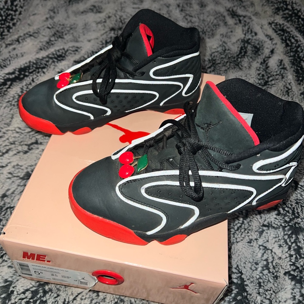 Melody Ehsani Women’s X Air Jordan OG SP “cherry” sneakers